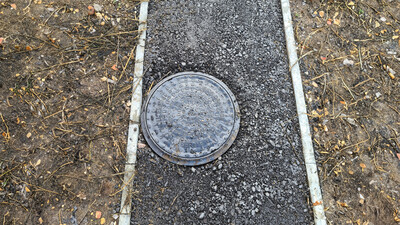 vision inspection chamber cover installed in a tarmac path