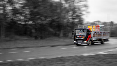 Drainfast delivery truck travelling at speed