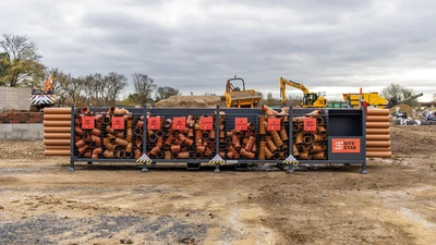 Front view of a SiteStak workstation full of underground drainage