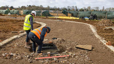 Manhole Road MuckStopper Installation
