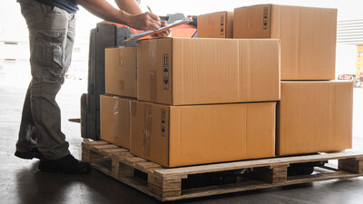 Delivery pallet with carboard boxes