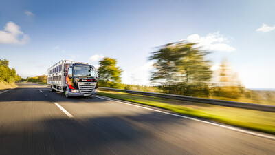 Drainfast 7.5t truck travelling at speed through a beautiful autumnal landscape 
