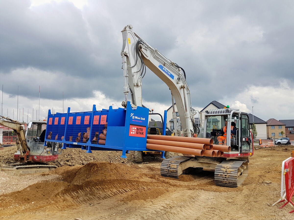 JJ Mac SiteStak moving with Excavator 