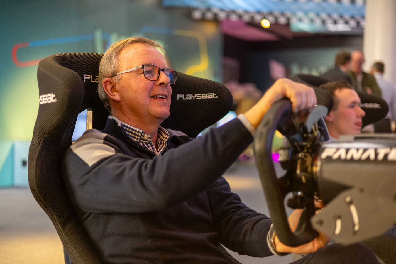 Tim James at Mercedes-Benz World driving simulators