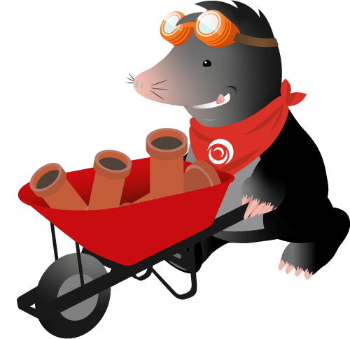 Digby the mole, walking with a wheelbarrow full of pipe fittings.